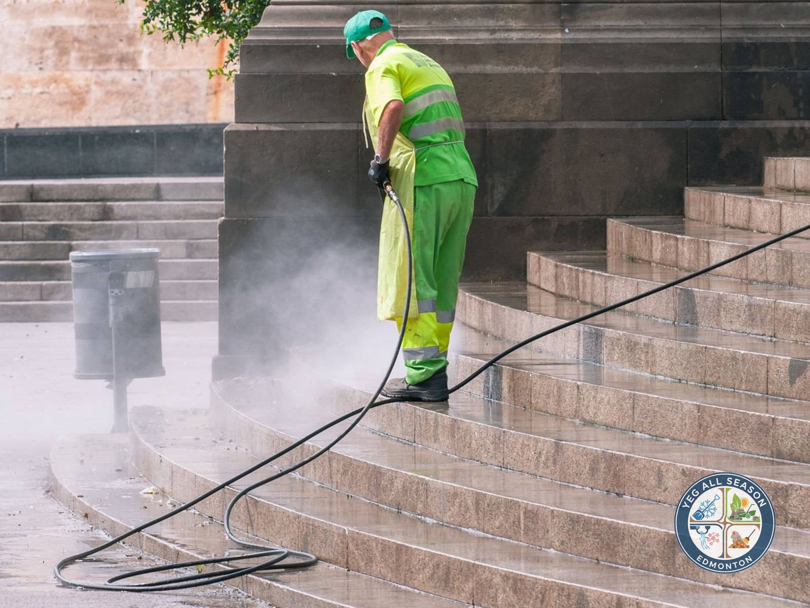 Pressure washing a concrete driveway